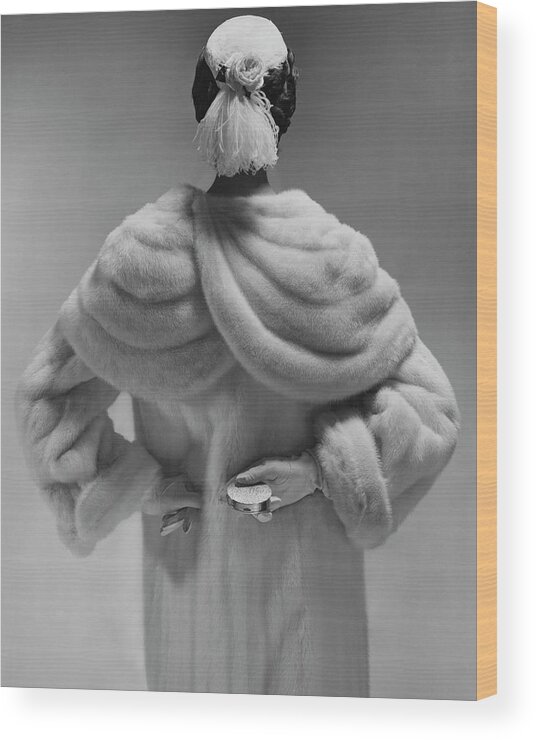 Accessories Wood Print featuring the photograph A Model Wearing A Mink Coat by Erwin Blumenfeld