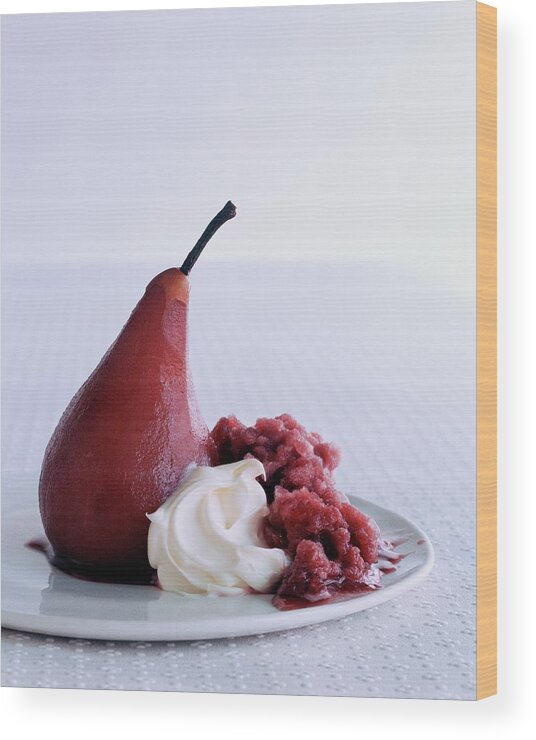 Vegetables Wood Print featuring the photograph A Poached Pear With Cream by Romulo Yanes