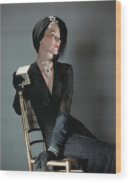 One Person Wood Print featuring the photograph A Portrait Of Lisa Fonssagrives Sitting by Horst P. Horst