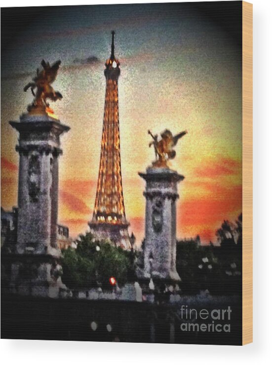 Eiffel Tower Wood Print featuring the mixed media a sunset view from the Seine by Lauren Serene
