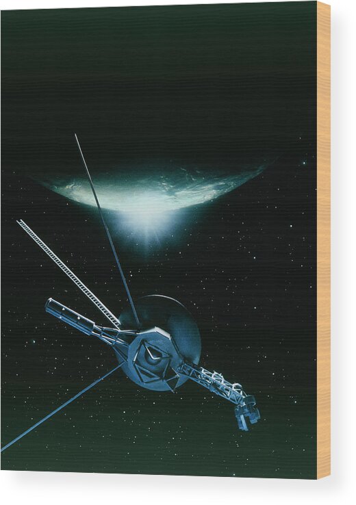 Voyager 2 Wood Print featuring the photograph Artwork Showing Voyager 2 Leaving Triton by Julian Baum/science Photo Library