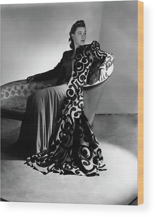 Fashion Wood Print featuring the photograph Bridget Bate Tichenor Sitting On A Chaise Lounge by Horst P. Horst