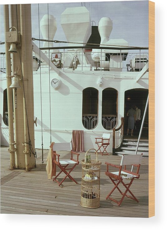 Interior Wood Print featuring the photograph Directors Chairs In Front Of The Ship The Queen by Tom Leonard