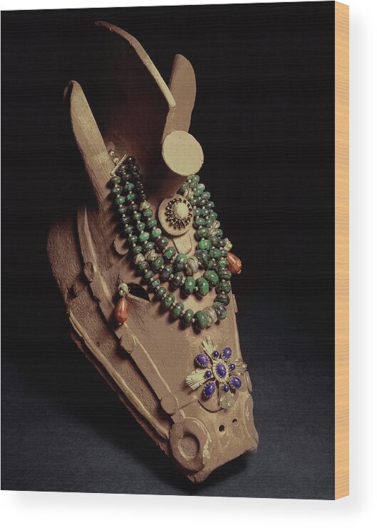 Jewelry Wood Print featuring the photograph Jewelry On Clay Horse Head by John Rawlings