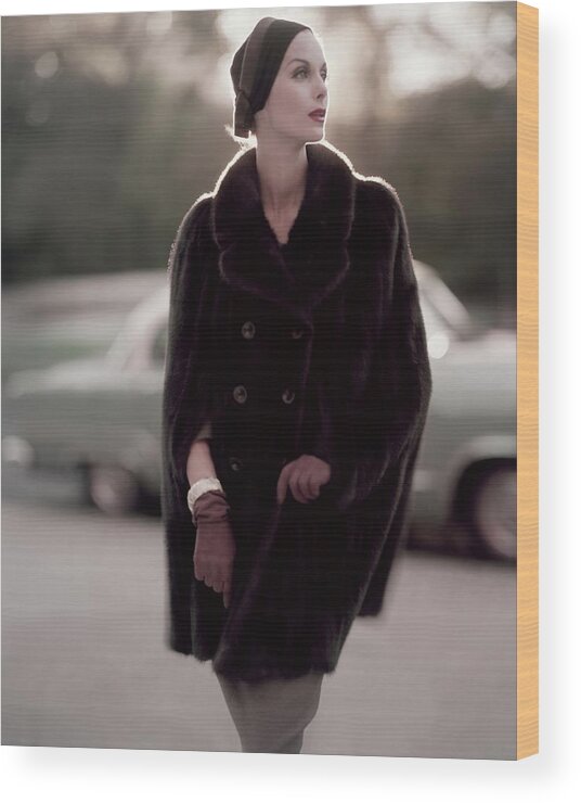 Fashion Model Wood Print featuring the photograph Model Wearing A Fur Cape by Karen Radkai