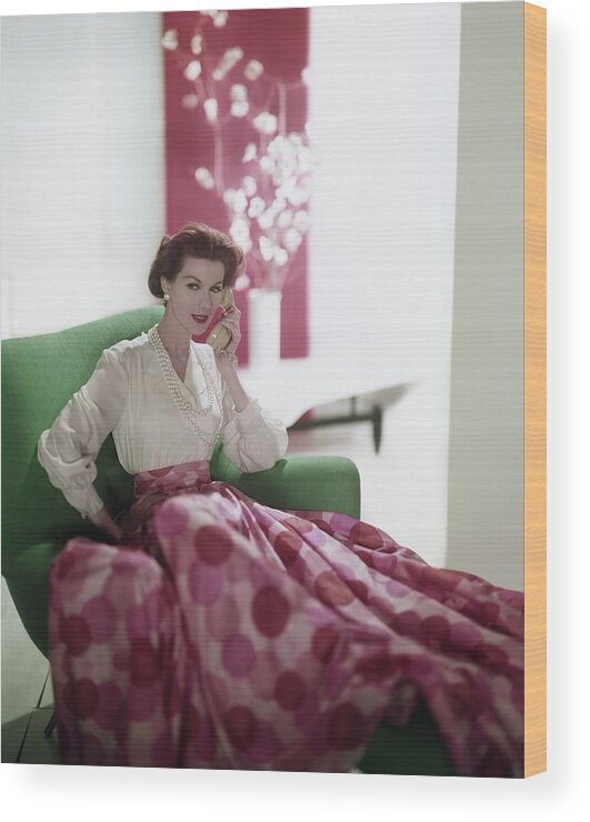 Indoors Wood Print featuring the photograph Model Wearing Polka Dot Skirt by Horst P. Horst