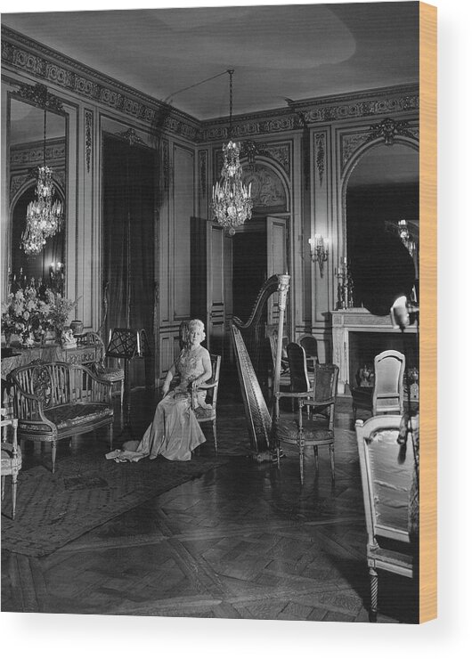 Home Wood Print featuring the photograph Mrs. Cornelius Sitting In A Lavish Music Room by Cecil Beaton
