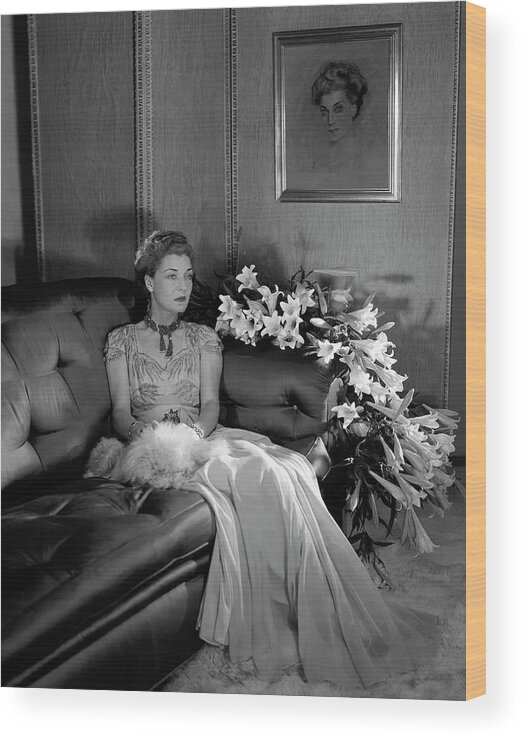 Animal Wood Print featuring the photograph Mrs. Harrison Williams Seated With A Dog by Horst P. Horst