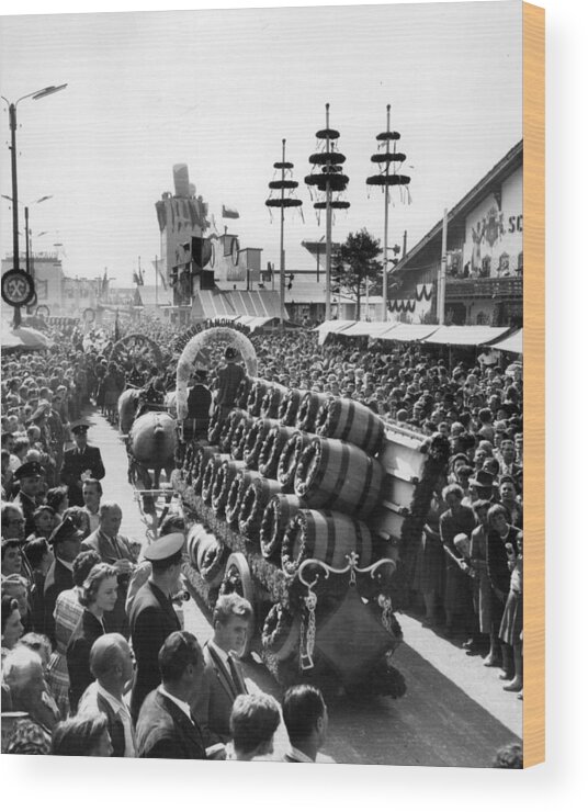 Retro Wood Print featuring the photograph Munich Germany Beer Kegs Celebration by Retro Images Archive