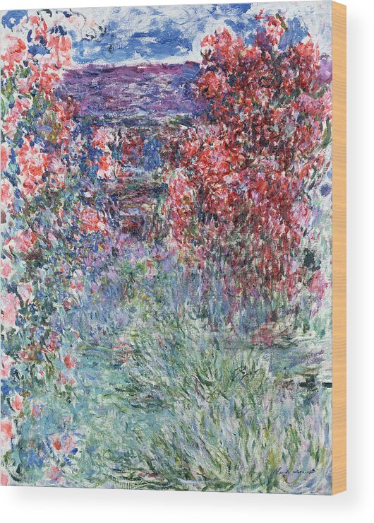 Pink Wood Print featuring the painting The House at Giverny under the Roses by Claude Monet