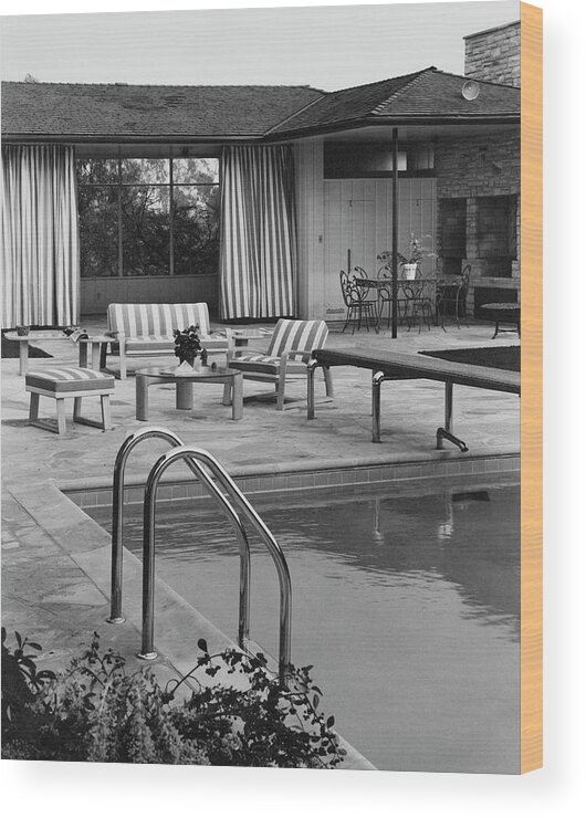 Architecture Wood Print featuring the photograph The Pool And Pavilion Of A House by Sharland 