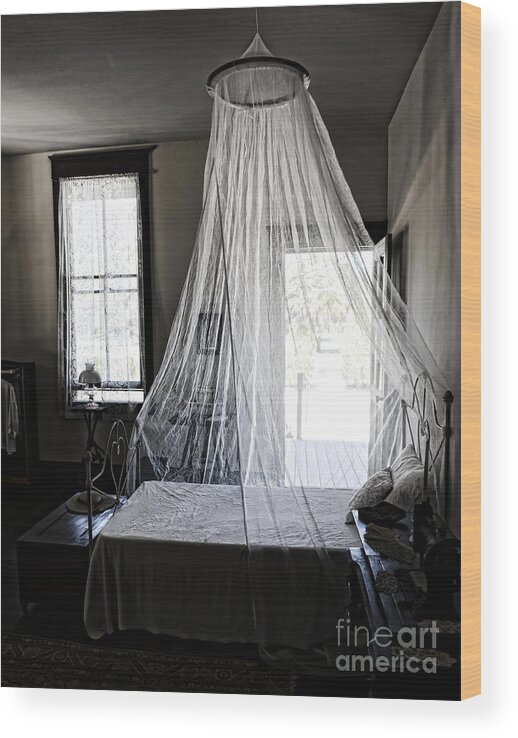 Estero Wood Print featuring the photograph Bed with Mosquito Net at Koreshan State Historic Site in Florida by William Kuta