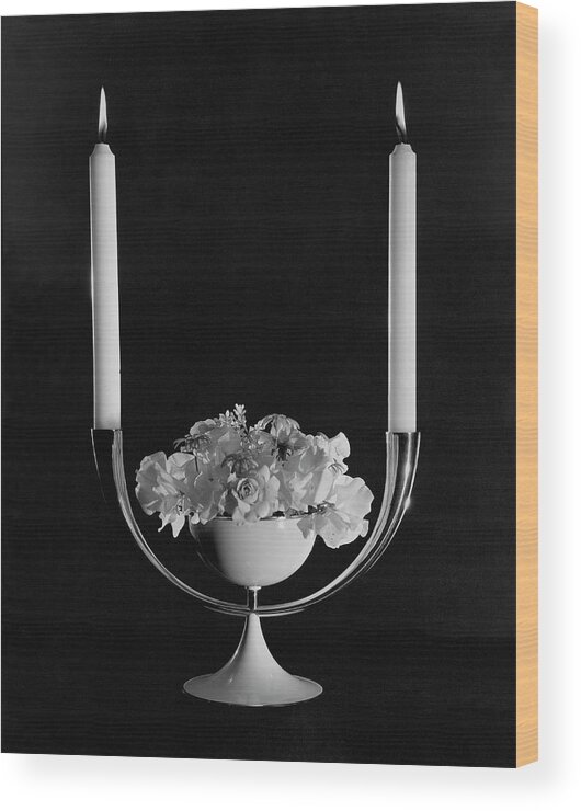 Studio Shot Wood Print featuring the photograph Two Burning Candles And And Some Flowers by John Rawlings