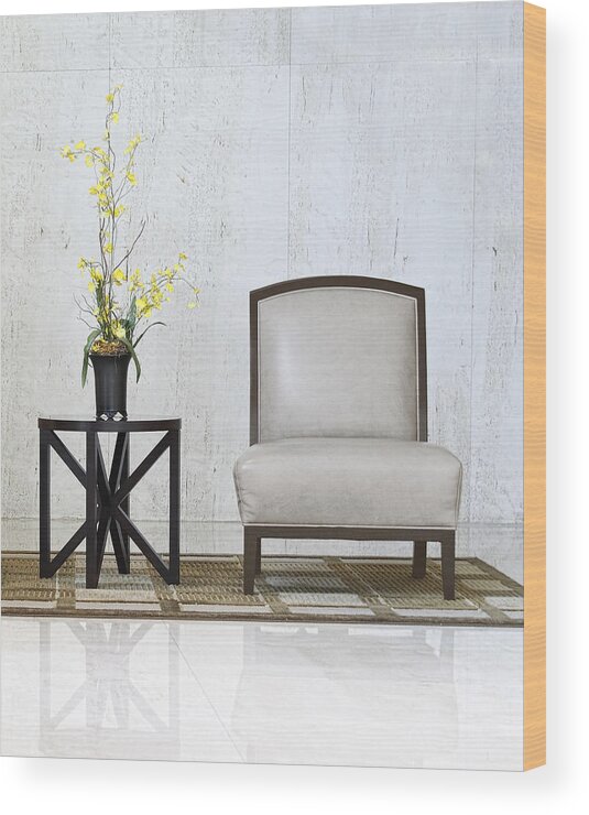 Table Wood Print featuring the photograph A chair and a table with a plant #1 by Rudy Umans