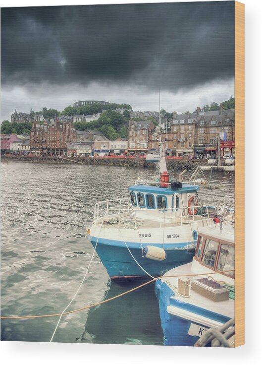Oban Wood Print featuring the photograph Oban Harbour under a dark sky by Ray Devlin