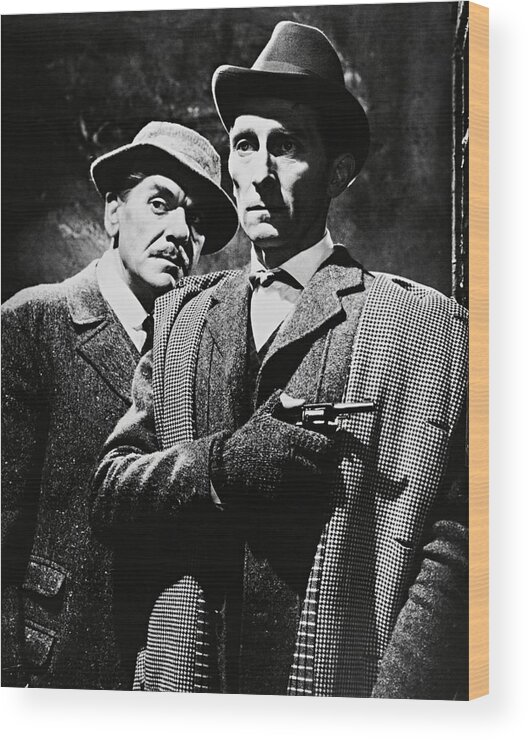 Andre Morell Wood Print featuring the photograph PETER CUSHING and ANDRE MORELL in THE HOUND OF THE BASKERVILLES -1959-. #1 by Album