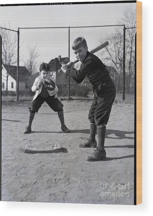 Child Wood Print featuring the photograph Two Boys Playing Baseball #1 by Bettmann