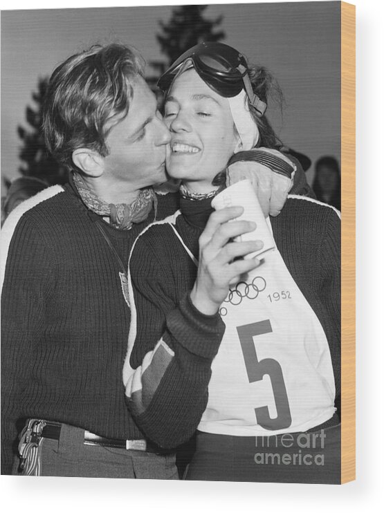 Following Wood Print featuring the photograph Andrea Mead-lawrence Gets Kiss by Bettmann