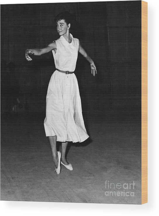 Belgium Wood Print featuring the photograph Audrey Hepburn Dancing The Gavotte by Bettmann