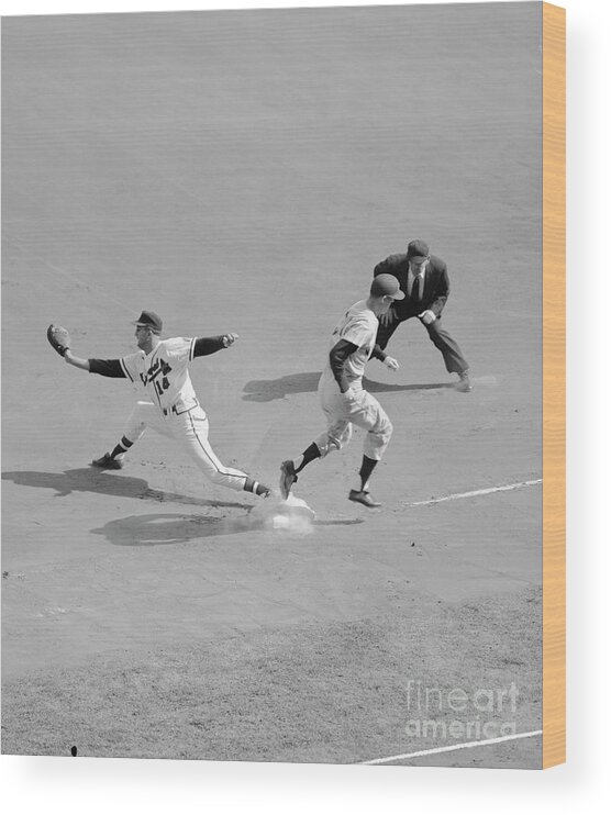 People Wood Print featuring the photograph Baseball Player Crossing Base In Time by Bettmann
