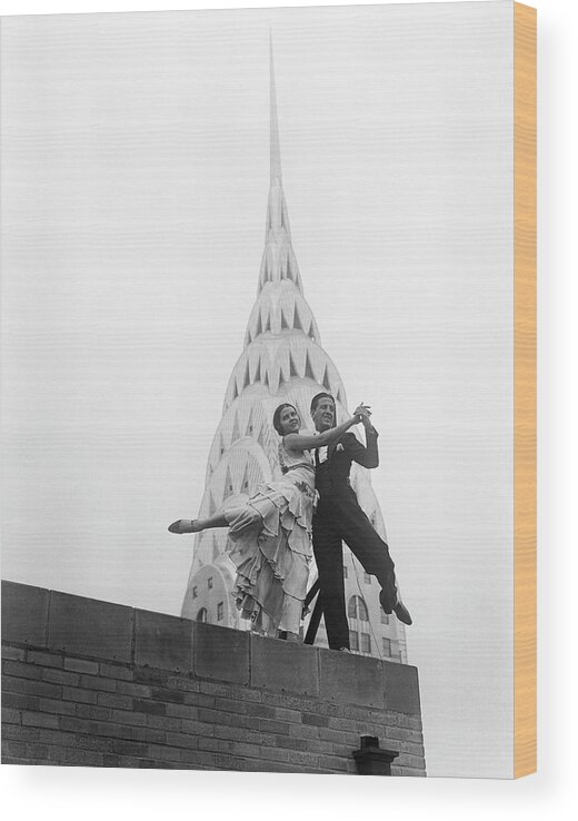 Artist Wood Print featuring the photograph Dancing By The Chrysler Building by Bettmann