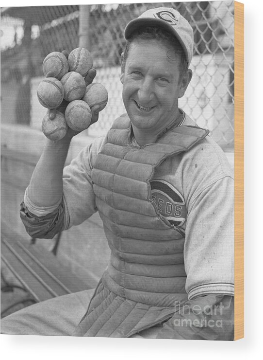 Baseball Catcher Wood Print featuring the photograph Ernie Lombardi Holding Seven Baseballs by Bettmann