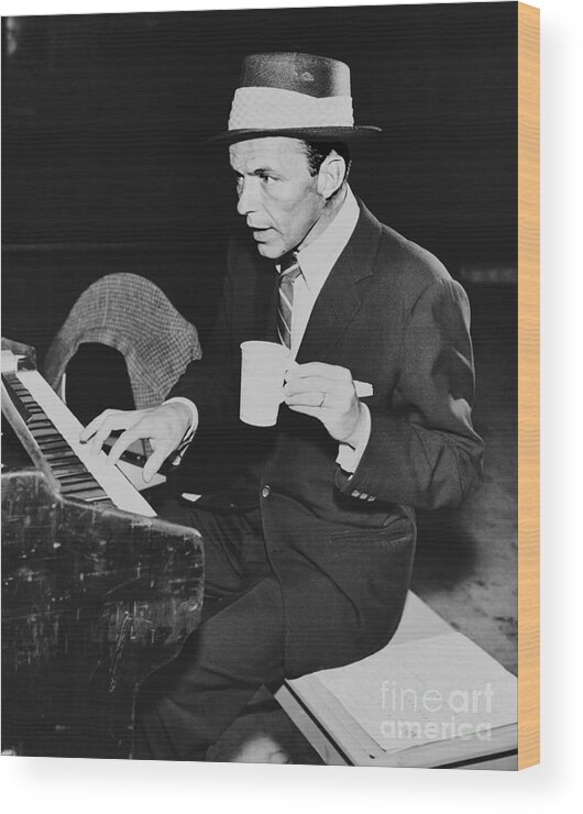 Working Wood Print featuring the photograph Frank Sinatra Playing Piano by Bettmann