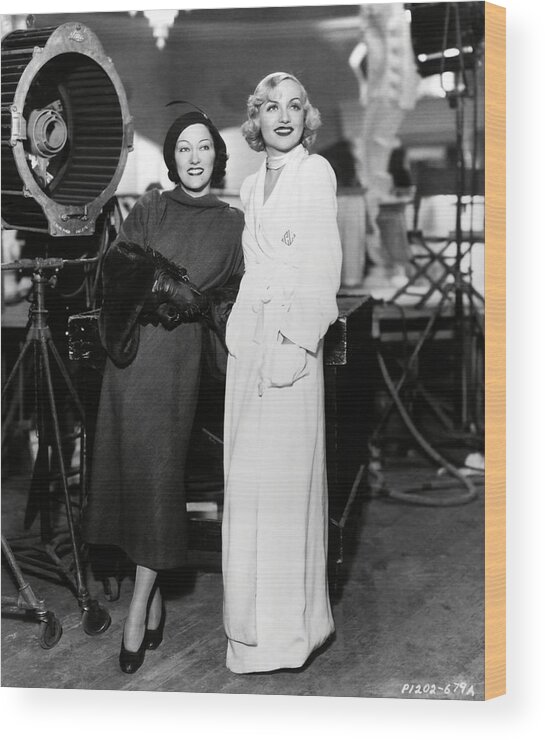 Carole Lombard Wood Print featuring the photograph GLORIA SWANSON and CAROLE LOMBARD in BOLERO -1934-. by Album