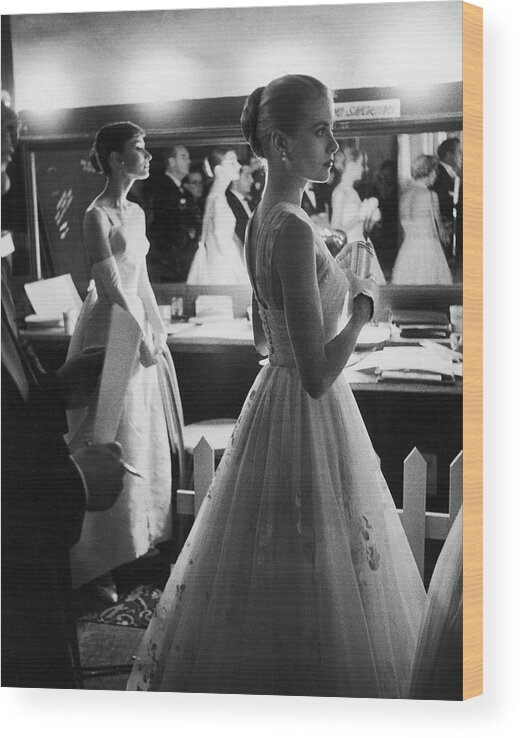 Black And White Wood Print featuring the photograph Grace Kelly and Audrey Hepburn by Allan Grant