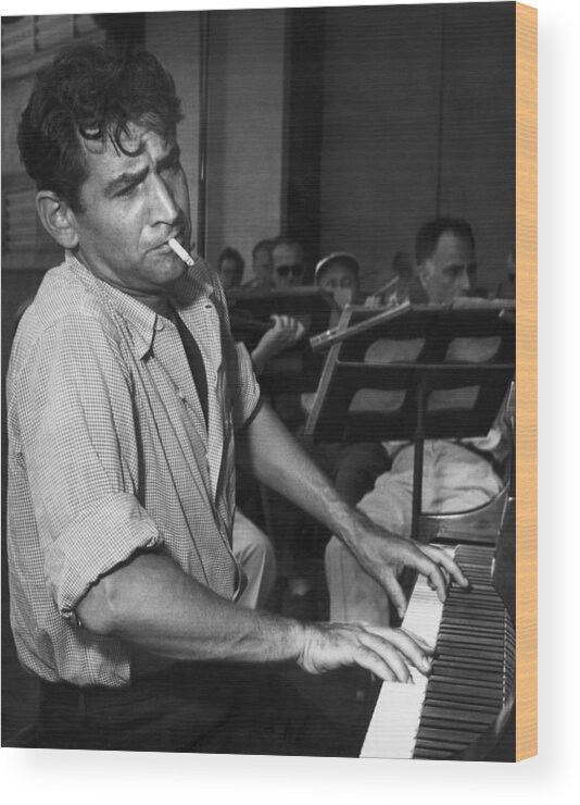 Smoking Wood Print featuring the photograph Leonard Bernstein Smoking At Piano by Bettmann
