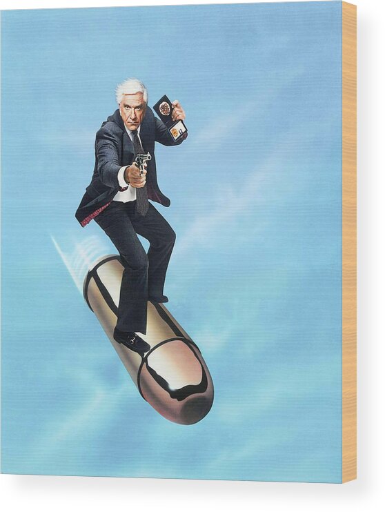 Leslie Nielsen Wood Print featuring the photograph LESLIE NIELSEN in THE NAKED GUN FROM THE FILES OF POLICE SQUAD -1988-. by Album