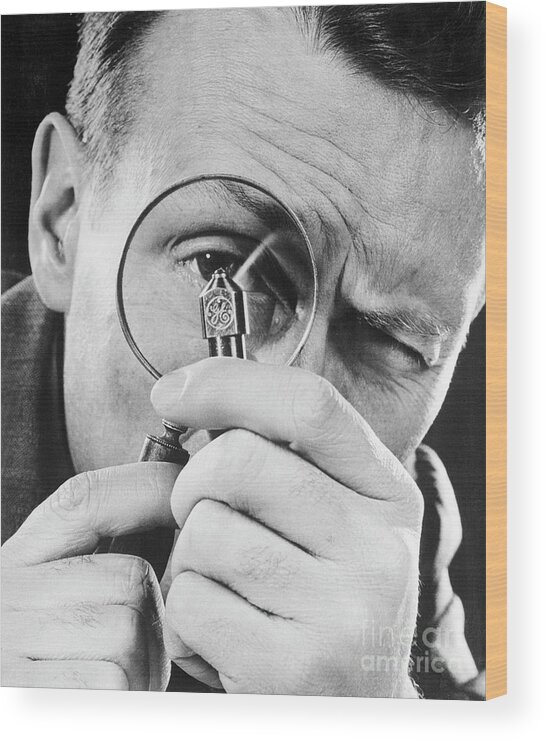 Gemstone Wood Print featuring the photograph Man Examining A Diamond Pointed Tool by Bettmann