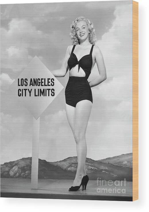 Marilyn Monroe Posing In Bathing Suit Wood Print by Bettmann 