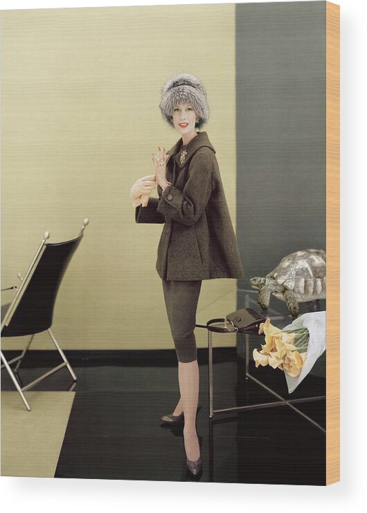 Fashion Wood Print featuring the photograph Model In A Paul Parnes Ensemble by Henry Clarke