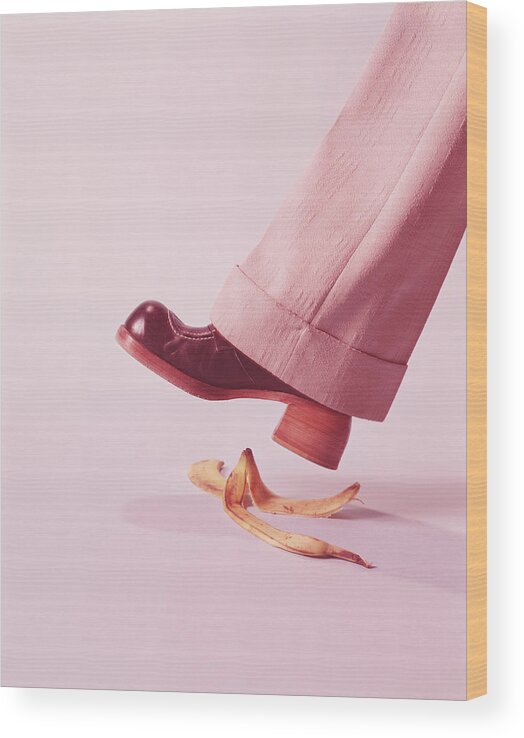 People Wood Print featuring the photograph Person About To Step On Banana Skin by H. Armstrong Roberts