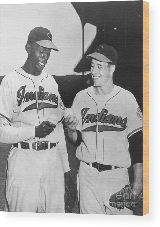 American League Baseball Wood Print featuring the photograph Satchel Paige Bob Feller Comparing by Transcendental Graphics
