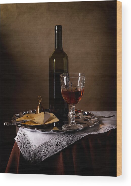 Background; Still Life; Food; Sweet; Colorful; Decoration; Fresh; Natural; Rustic; Yellow; Closeup; Diet; Ingredient; Feast; Group; Old Style; Wine; Cheese; Brown; Beam; Light; Drapery; Tablecloth; Table; Bottle; Glass; Knife; Tray; Silver; Red; Handbell; Wood Print featuring the photograph Still Life With Red Wine And Cheese. by Magnola