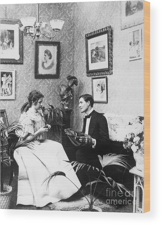 People Wood Print featuring the photograph Victorian Couple Alone Knitting by Bettmann