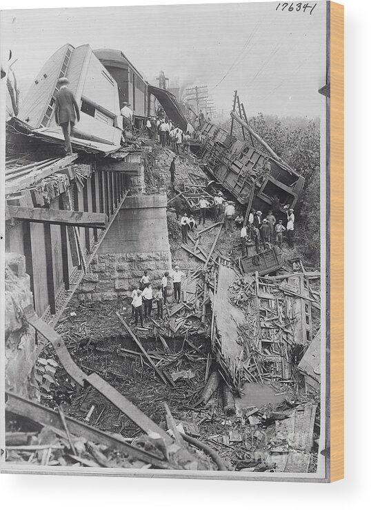 People Wood Print featuring the photograph Workers On Train Wreck Debris by Bettmann