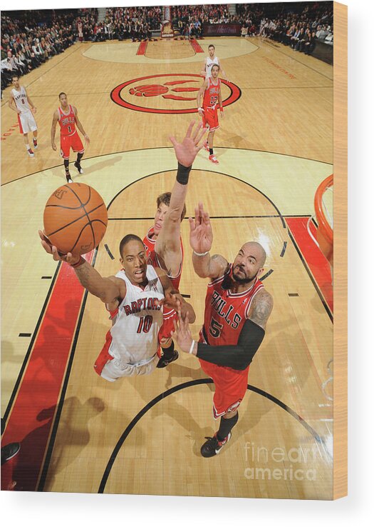 Nba Pro Basketball Wood Print featuring the photograph Carlos Boozer and Demar Derozan by Ron Turenne