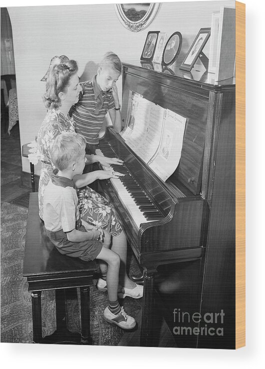 1943 Wood Print featuring the photograph Family At Piano, 1943 by Granger