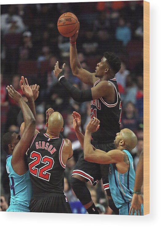 Chicago Bulls Wood Print featuring the photograph Jimmy Butler, Michael Kidd-gilchrist, and Taj Gibson by Jonathan Daniel