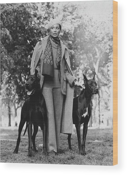 Accessories Wood Print featuring the photograph Model Beverly Johnson With Two Great Danes by Francesco Scavullo