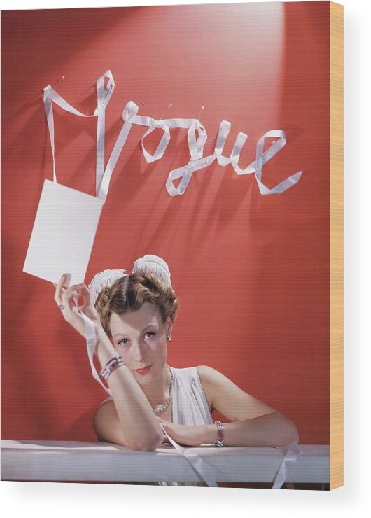 Model Wood Print featuring the photograph Model with White Ribbon and Card by Horst P Horst