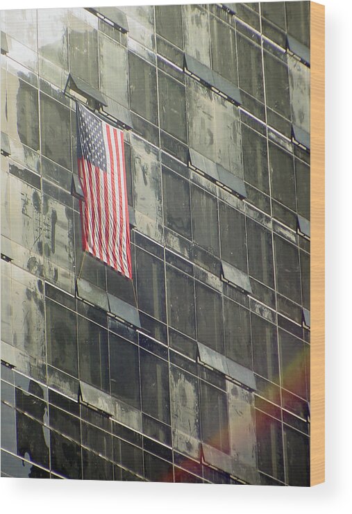 Sep. 11 Wood Print featuring the photograph After Sep. 11 flag on Millennium hotel by Mieczyslaw Rudek