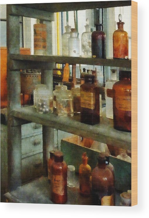 Science Wood Print featuring the photograph Chemist - Bottles of Chemicals Tall and Short by Susan Savad