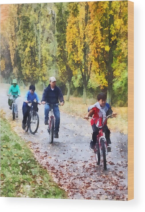 Autumn Wood Print featuring the photograph Family Bike Ride by Susan Savad