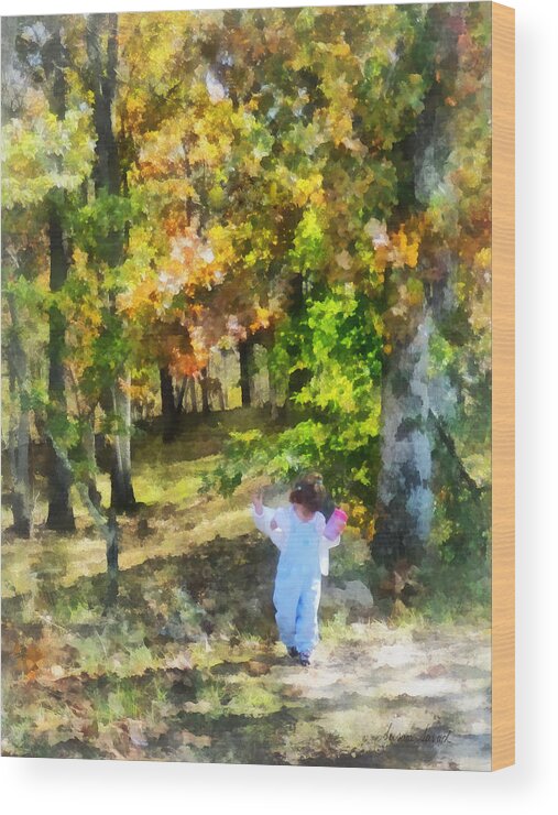 Girl Wood Print featuring the photograph Little Girl Walking in Autumn Woods by Susan Savad