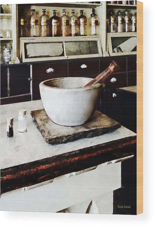 Apothecaries Wood Print featuring the photograph Mortar and Pestle in Apothecary by Susan Savad