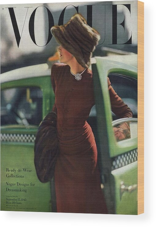Auto Wood Print featuring the photograph Vogue Cover Featuring A Woman Getting by Constantin Joffe